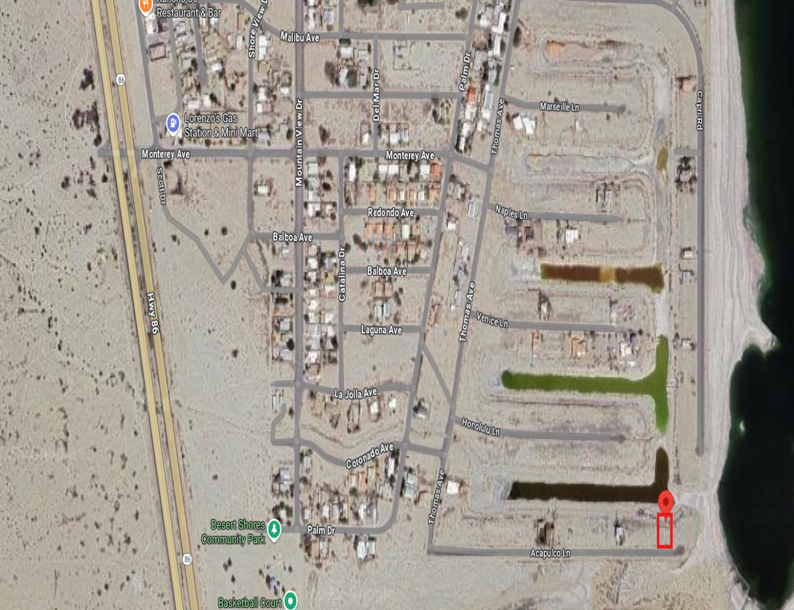 AMAZING LAKE FRONTAGE LOT WITH BEAUTIFUL SCENERY OF THE MOUNTAINS!! LOW MONTHLY PAYMENTS OF  $ 225.00  150 Acapulco Ln., Thermal, CA 92274  APN: 001-170-021-000 - Get Land Today