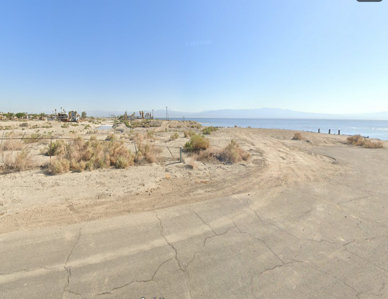 AMAZING LAKE FRONTAGE LOT WITH BEAUTIFUL SCENERY OF THE MOUNTAINS!! LOW MONTHLY PAYMENTS OF  $ 225.00  150 Acapulco Ln., Thermal, CA 92274  APN: 001-170-021-000 - Get Land Today